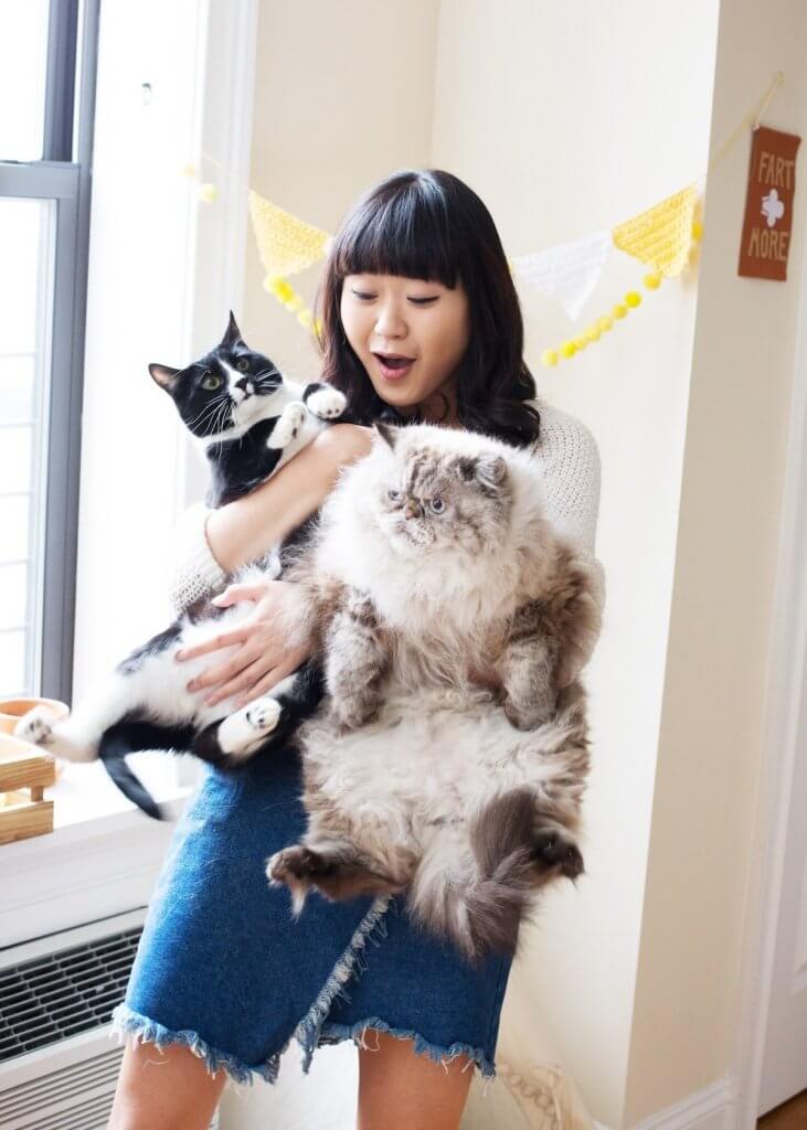 Woman with 2 cats